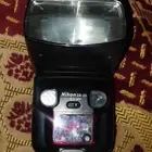 فلاش نيكون و عدسات