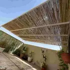 من أعمالناء مظلات خيزران