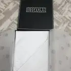 شماع أبيض و ساعة يد و بكت