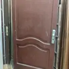 ابواب خشب مستخدمه وابواب حديد والمنيوم تجديد للبيع