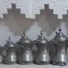 دلال طقم عمل بغداد نحاس احمر