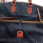 شنطة Dooney   Bourke اصلية ما فيها ولا قطعة جديدة السعر 700
