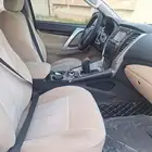 مونتيرو متسوبيشي موديل 2019دبل لون ابيض فتحه سقف ممشى قليل