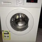 للبيع غسالة اوتماتيك يوجين شبه الجديد وعلى الشرط مضمون