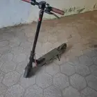 Clean scooter with its charger