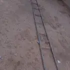 سلم حديد ثقيل طويل 14 درجه ارتفاع لا تصتيع ان تحمله الا بقوه