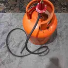 أسطوانة غاز مع ساعه وخرطوم