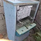 برادة سبيل مع خزان صغير