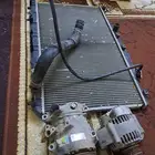 قطع كامري للبيع رديترار مويه وكمبروسر ودينمو كامري من2002