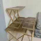 طاول كبيره مع 6 طاولات صغيره لون ذهبي