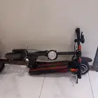 سكوتر كهربائي جديد مع اغراضه