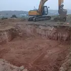 بكلين لقص الاراضي وبنا الحجر وحفريات قواعد
