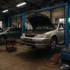 ورشه لصيانة السيارات .