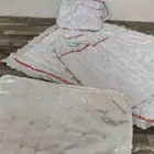 شنطه بطانيه قبعه مدس حمالة المولود لون ابيض غير مستعملة