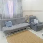 كنبة ضيوف تصير سرير مع كرسي