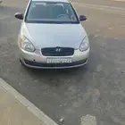 اكسنت موديل 2009 قير عادي مافيها شي غير الكبود مغير فقط