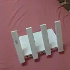 مقوي من شركة هواوي واي فاي AX3 يعمل المقوي عن طريق السلك