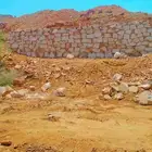 مباني حجر وقص الأراضي وتكسير الصخور لتواصل