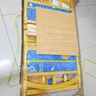 سرير اطفال خشب جديد بكرتونه للبيع المستعجل