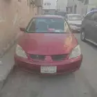 لانسر 2011 للبيع مافي فحص