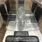 طاولة طعام زجاجية