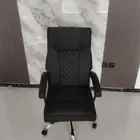 Office furniture swivel and fixed leather chairs in cartons