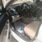 ميتسوبيشي لنسرر 2014ارش فبريكه بره وجوه