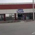 للتقبيل معرض مواد بناء على شارعين زاويه