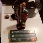 ماكينة قهوة نسبريسو ميني لون اسود مع كابسولات