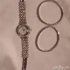 ساعة نسائية مع اسوارتين