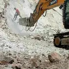 قص الاراضي وتفتيت الصخور والمباني والحفريات