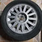 للبيع جنط اصلي بلد جراند ماركيز 2011