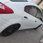 سياره كيا سيراتو للبيع فيها بعض الرشوش فحص جديد