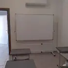 سبورات وطاولات وكراسي