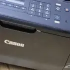 طابعه كانون ملون جديدة لم تستخدم ينقصها الحبر والأسلاك