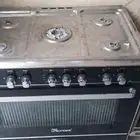 غاز كهربائي وأسطوانة شبة جديد شغال ع الشرط