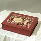 علب خشبية وعلب جلود