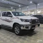 تويوتا هايلوكس ديزل 2.4 بصمه دخول ذكي دبل 2024 شبه الجديد