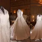 فستان زفاف جديد لبسه وحده فقط شك لؤلؤ وشامل الطرحه طويل