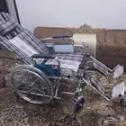 كرسي متحرك لكبار السن