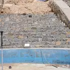 بناء جدران حجر حسب الطلب
