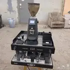 مكينه قهوة ايطاليه مع مطحنه شبه جديد استخدام 4 شهر