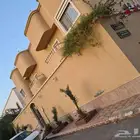 حي الفلاح 1 بناية مكونة من دورين و ملحق 4 شقق جاهزة والملحق