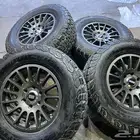 جنوط برايد 6 مسمار مع كفرات بي واي نص حجري مقاس 265 70 17