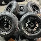 5 جنوط سوزوكي جمني مع كفرات نص حجري 235.75.15 ت22