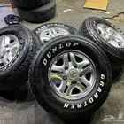 جنوط لكزز جيب لاند شفه نيكل مع كفرات دنلوب 275.70.16 ت23