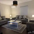شقة مفروشة مودرن مع سطح روف للإيجار ((حي الزهراء))
