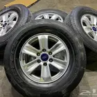 جنوط فورد اف 150 اصلي وكاله  مع كفرات برجستون 265.70.17 ت22