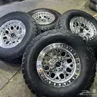 جنوط جي ام سي مع كفرات ودواي نص حجري مقاس 285 70 17