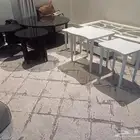 طاولة ومكيف وسيكل وبراده